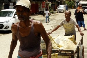 Cart puller with building materials